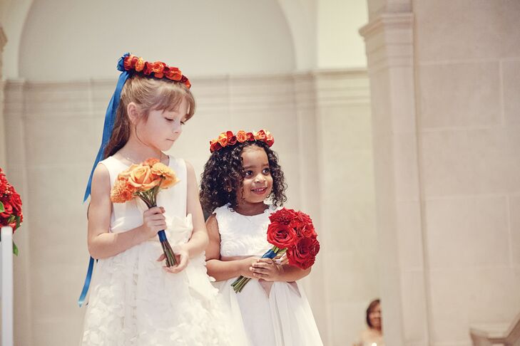 Flower girls wore ivory dresses with colorful flower crowns and bouquets. “We wanted the flower girls dressed to be ivory with hint of gold while resembling the brides dress in some way,” says Ariel.