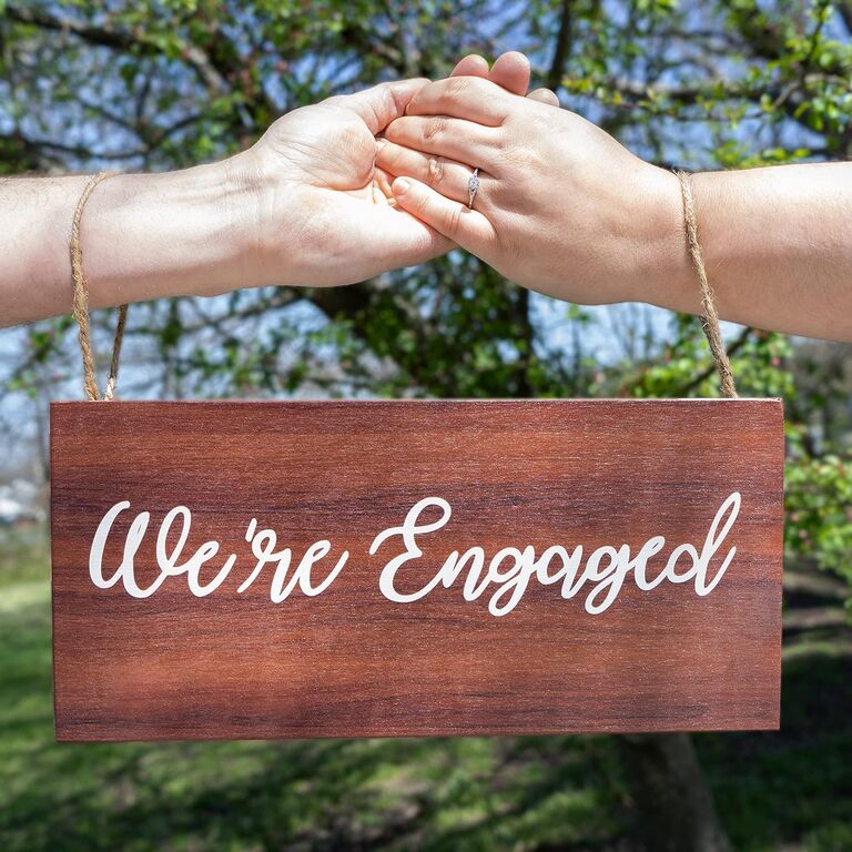 'we're engaged' wood sign engagement photo prop