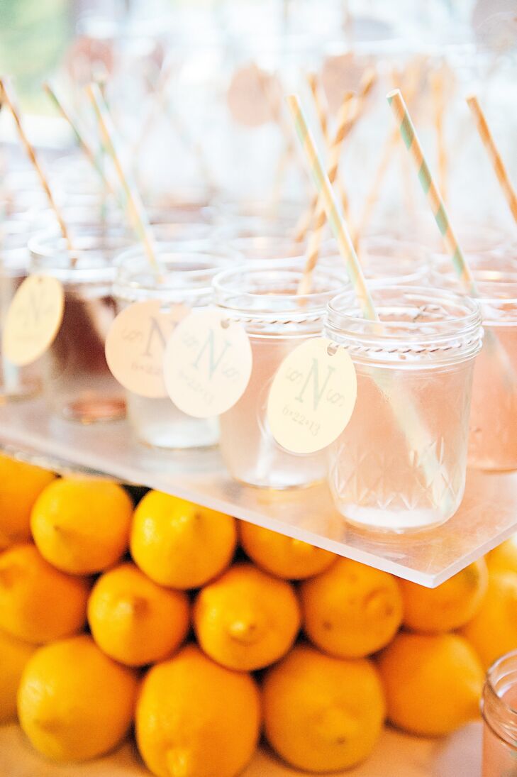 Guests enjoyed fresh lemonade served in Mason jar glasses with green and pink striped straws.