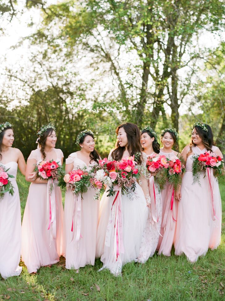 "I asked my six bridesmaids to choose their own blush/light pink dress in whatever style they felt comfortable, while my maid of honor had a floral design," Deborah says. "I really wanted their personalities to shine through with me on the wedding day. Their beautiful dresses tied in together and created a perfect mix and match."