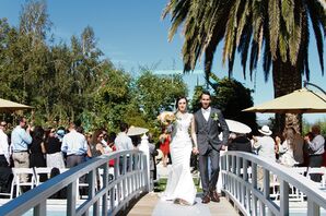 Bride and Groom Exit the Ceremony Over the Garden Bridge