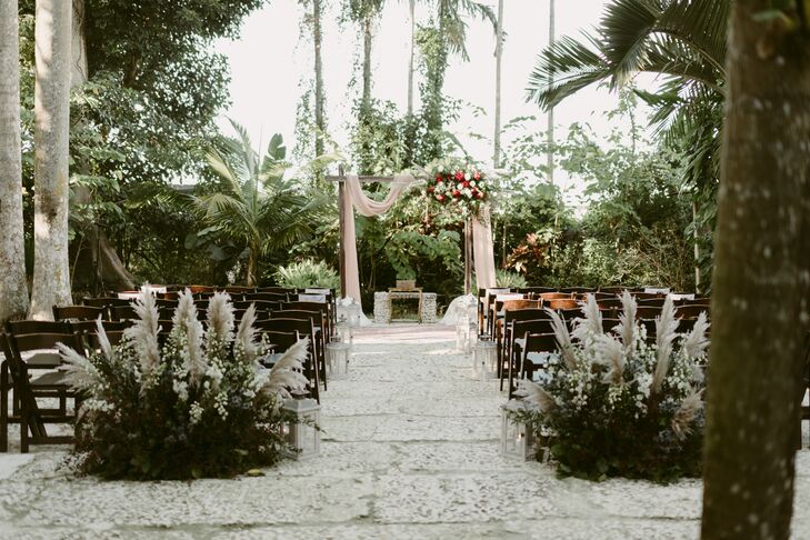 Tropical Ceremony with Wedding Arch and Aisle Decorations