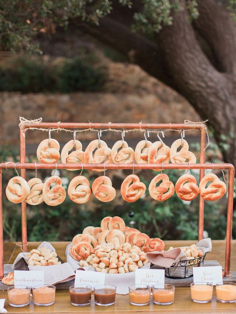 Soft pretzels hanging from interactive display