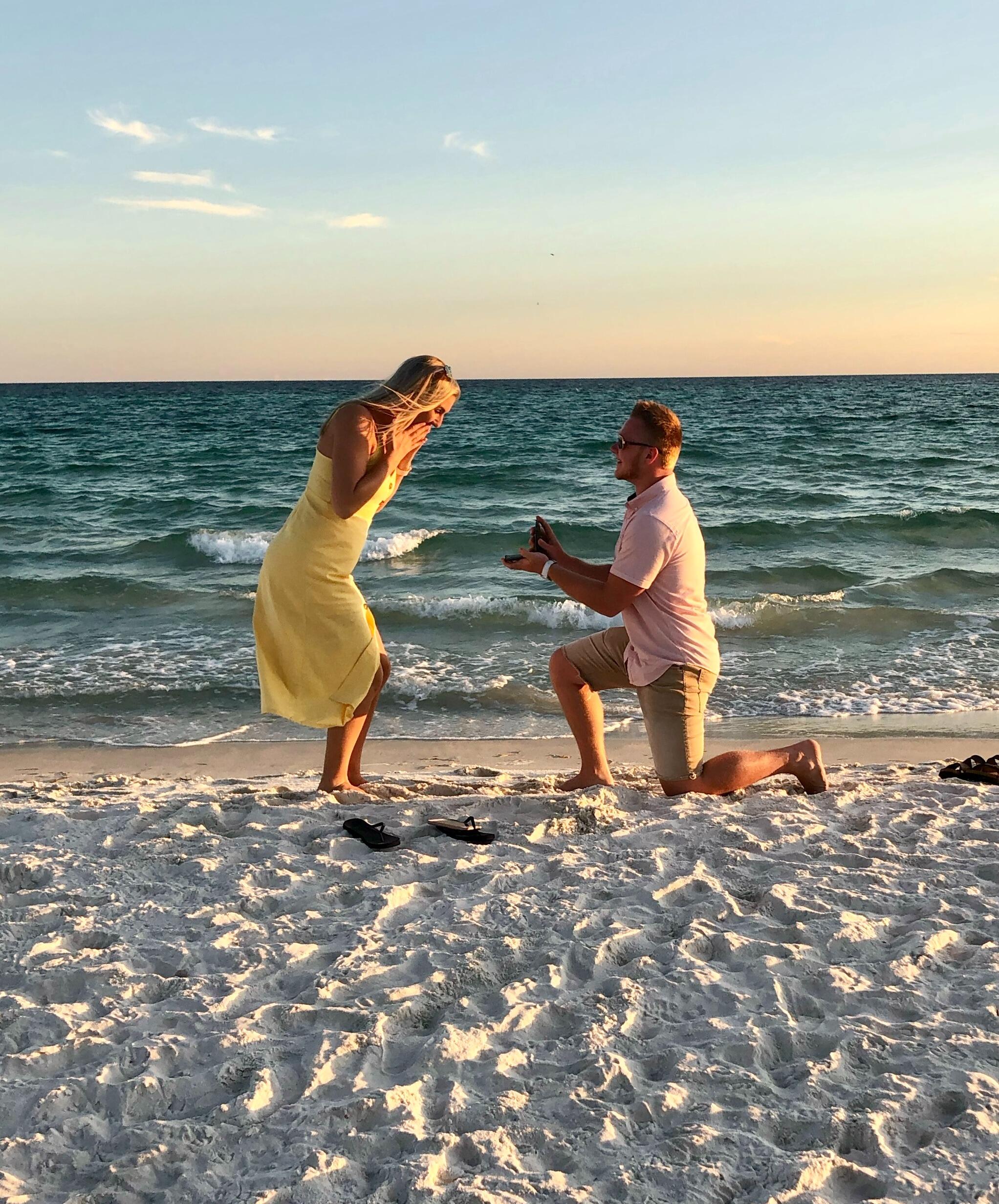 Sophomore year Florida trip—just friends, a sunset, and a playful “proposal” with a wallet. Who knew the real one was coming six years later?