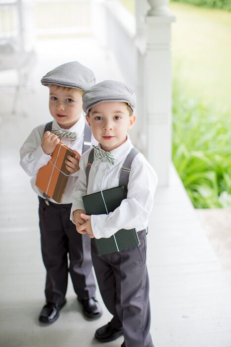 The ring bearers wore vintage inspired gray suits with suspenders and newsboy caps.