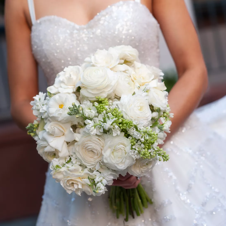 Ranunculus and gardenia white wedding bouquet
