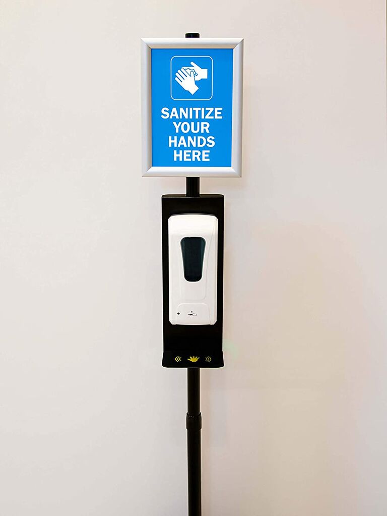 Freestanding hand sanitizer station with sign