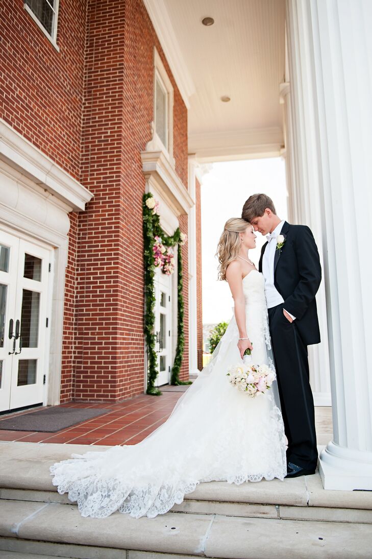 Trae's traditional black and white tux complemented Sara Beth's romantic scalloped strapless lace Madeline Gardner gown.
