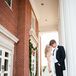 Trae's traditional black and white tux complemented Sara Beth's romantic scalloped strapless lace Madeline Gardner gown.