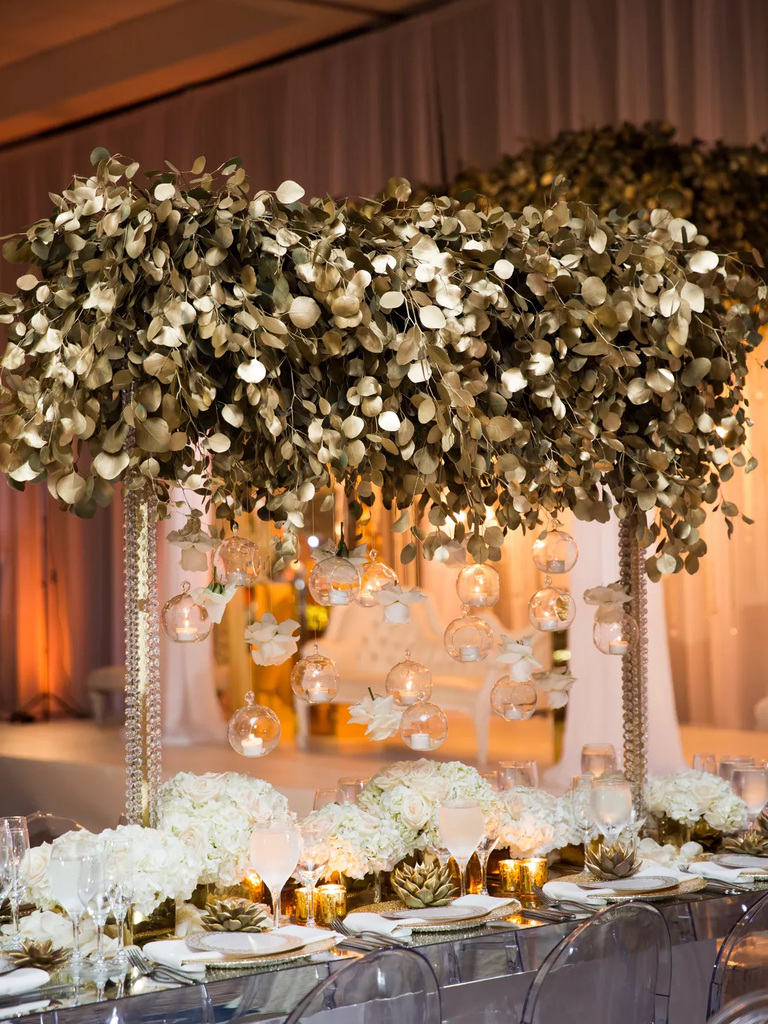 Golden eucalyptus wedding arrangements