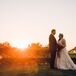 Cassandra and Stephen stood outside as the sun set on the Lodge at Torrey Pines in San Diego, California. Cassandra wore an elegant champagne-colored Alfred Angelo dress with a lace overlay, entirely accented in beads that matched her veil and hairpiece.
