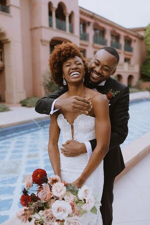 Happy Couple Laughs During Wedding Reception