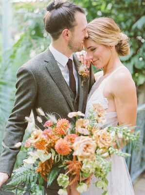 Bride and Groom Embrace During Wedding-Day Photos at The Greenhouse at Driftwood