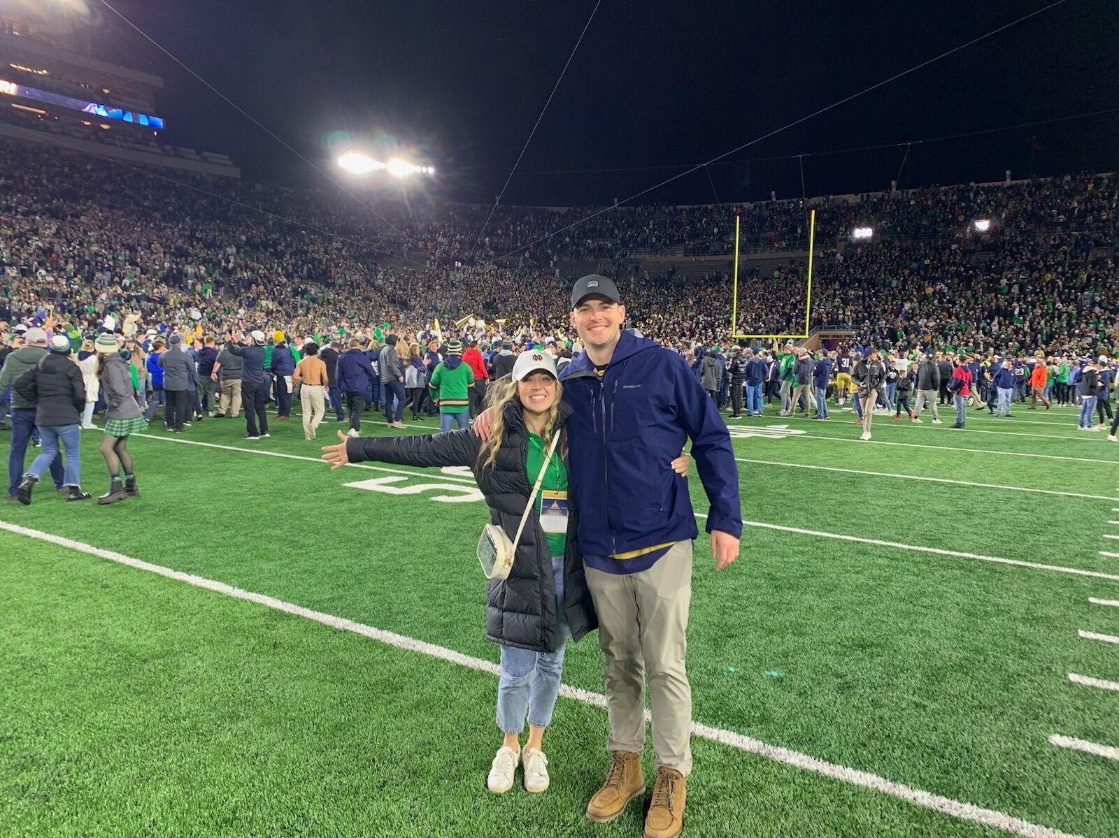 Picture of While dating, George and Michaela attended a lot of football games...