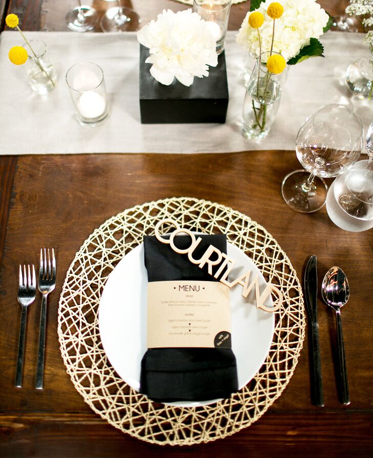 Instead of classic charger plates and place cards, Danielle and David decked out their tables with webbed wooden placemats and laser cut wooden name tags to mark each guest’s seat, striking the ultimate balance of rustic and modern aesthetics. “Everyone loved feeling like they were an important part of our special day, which, of course, they were, and folks tell us that they still have their names prominently displayed at home or work,” says Danielle.