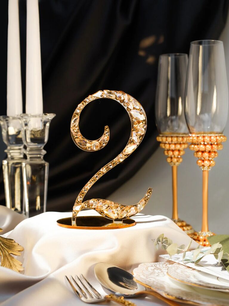 glamorous gold wedding table numbers decorated with rhinestones