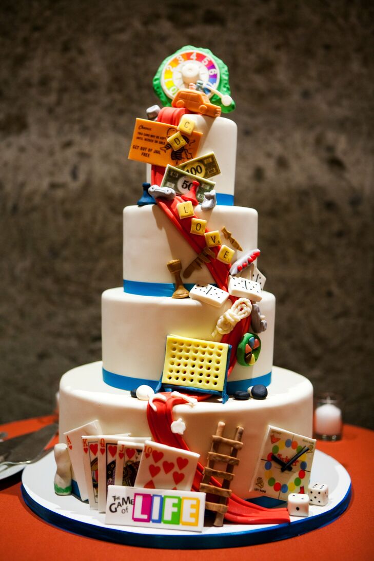 Doug and Chris love board games, so they incorporated their fun-loving personalities into their tiered wedding cake.