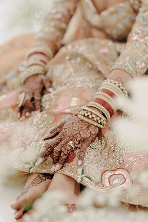 Sikh Bride, Henna Hand and Engagement Ring, Bracelet Bangles and Colorful Lengha, Ceremony