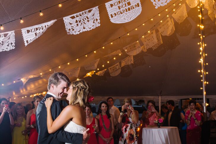 Keeping with their Tex-Mex inspiration, Caroline and Christopher ordered authentic papel picados from Mexico. Each white accent had the couple’s names and the words “love” or “happy day” surrounded by different intricate designs. One of them also had a surprise for the couple. “They spelled the groom’s name wrong, and it was too late to place another order,” Caroline says. “No one seemed to notice and the ones that did just laughed.”