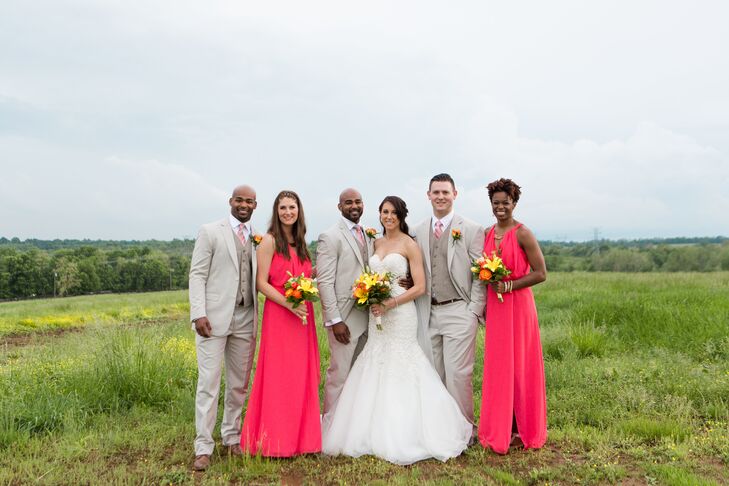 The bridesmaids wore bright guava-colored floor-length dresses, and the groomsmen wore neutral suits with pink ties to match the spring palette. All included pops of circus roses in their bouquets or boutonnieres.