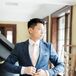Priscilla and Daniel bought his suit before they even got engaged. “We were casually shopping at Zara one time and came across a very cool textured navy suit,” Priscilla says. “He bought just the pants and after the engagement, he went back and bought the jacket.” He looked dapper and fit for the outdoor fete in a navy suit, white shirt and blush silk tie. His tie also matched the groomsmen's looks.