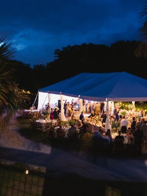 Tented Waterfront Reception With String Lights