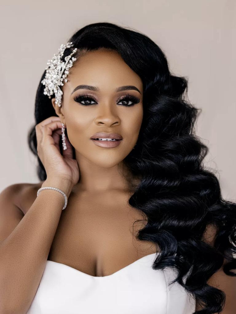 Bride with Side Swept Curls and Embellished Hairpiece