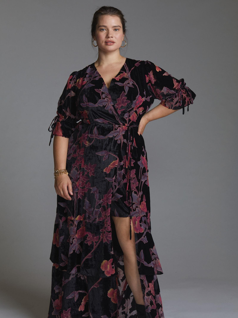 A model wears this lovely wintery floral gown.