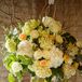 A lemon-filled vase added a fresh, playful touch to the floral centerpieces.
