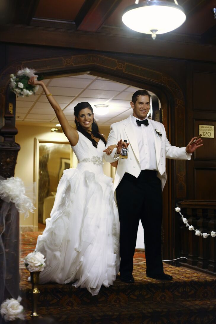 “The moment I tried on my dress, my mother and I both knew it was the one by the size of my smile,” Katie says. “I wore a White by Vera Wang dress, with all of the tulle and fabric for the dramatic entrance I always dreamed of. With a full train it required a French bustle for the reception, but I definitely did not mind carrying the weight of the beautiful train around with me.”