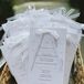 Amy created her own programs and printed everything on an off-white card stock. Small bows at the top added interest.