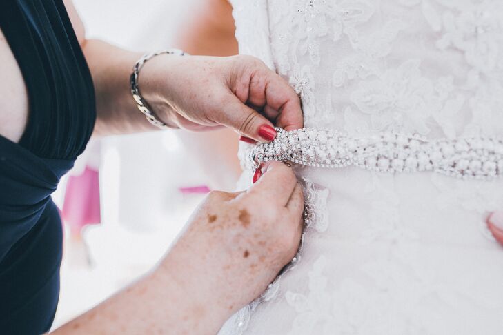 Jessica's uncle, a jewelry designer, created her beaded rhinestone sash.