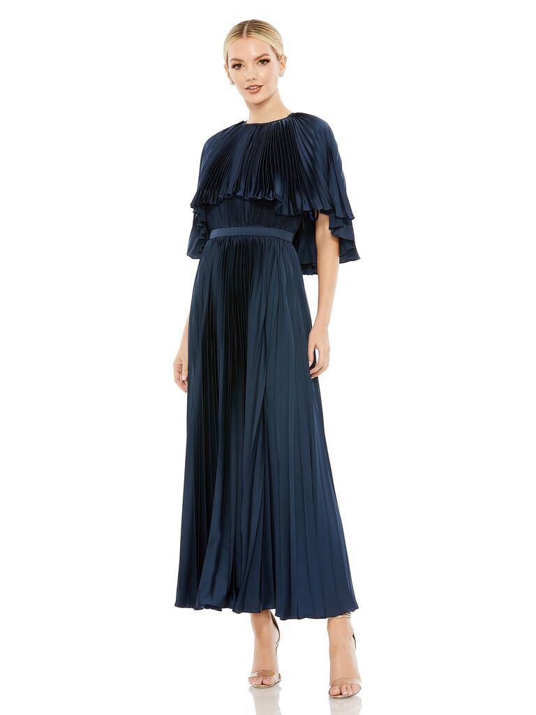 A blue textured tea-length gown with a capelet from Mac Duggal
