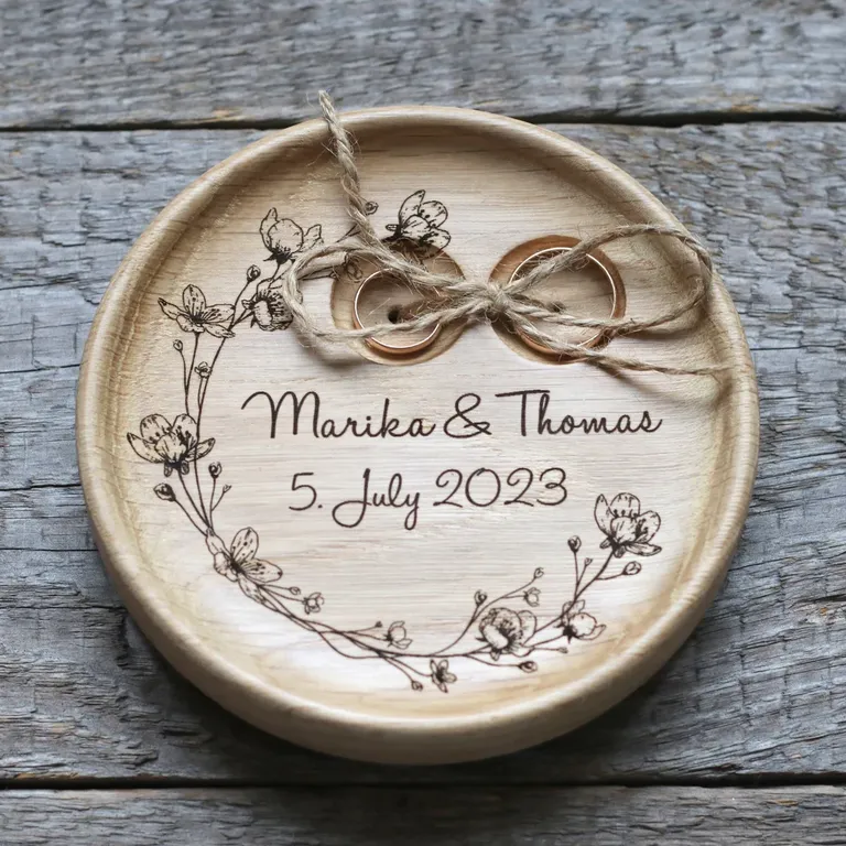Personalized wood ring bearer pillow with engraved floral detail