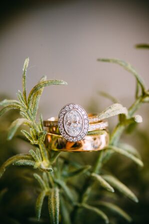 Oval Cut Diamond Ring with a Halo and Encrusted Gold Band
