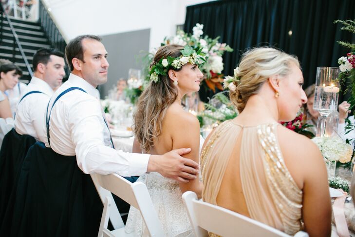 After 40 mph winds started pulling Claire and Rob's reception tent off the ground, the couple relocated their reception two hours before the ceremony. Their event designer, Brianna from Fox & Fern Floral, and Denae, from Denae Brennan Weddings & Events, hopped to it and found the Historic Riverside Building in Rochester, Minnesota. All the vendors broke everything down and set up what proved to be the most beautiful venue.